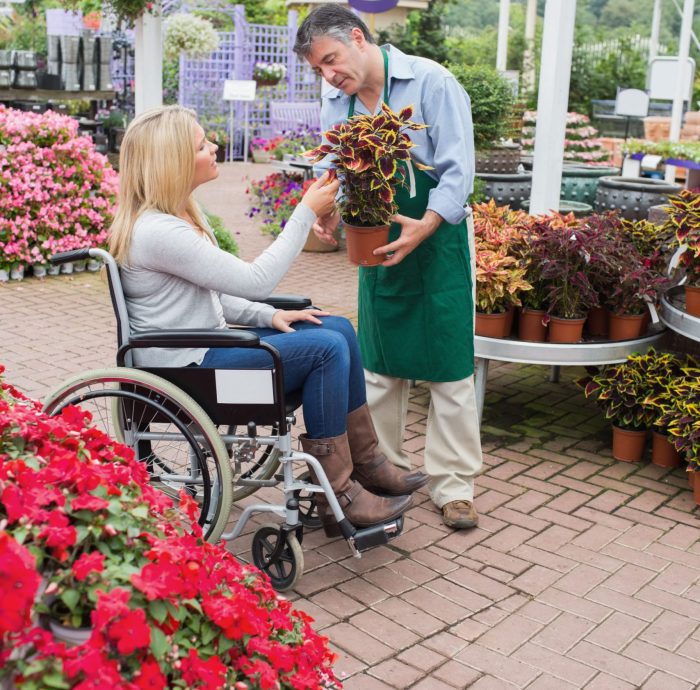woman-wheelchair-buying-flower (1)